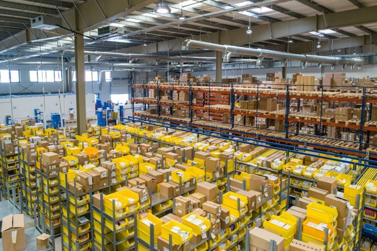 Modern commercial logistics and distribution center in Ireland hiring permit workers